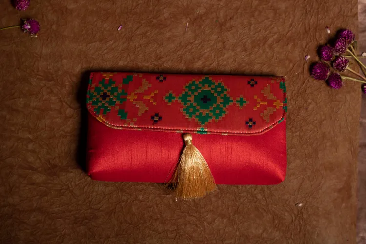 Orange Ikat Print Clutch Bag