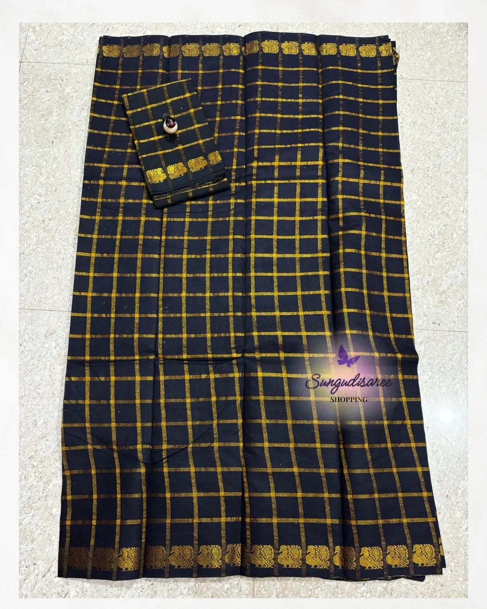 Black self pavithra zari kattam saree