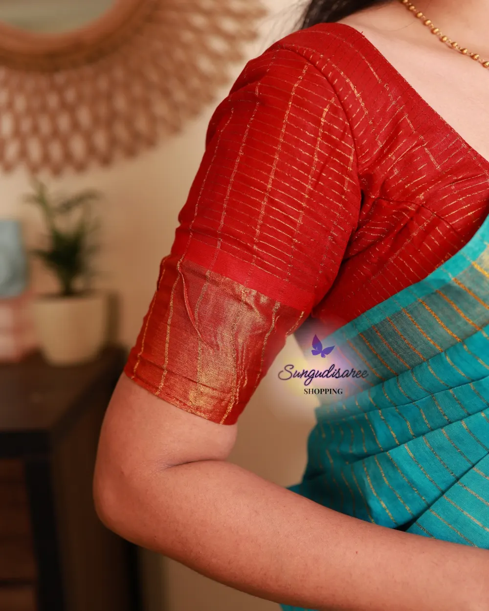 Sky blue saree with red blouse