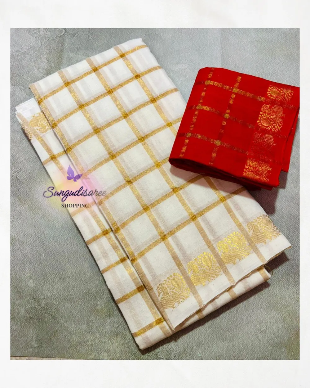 Half white saree with reddish orange blouse