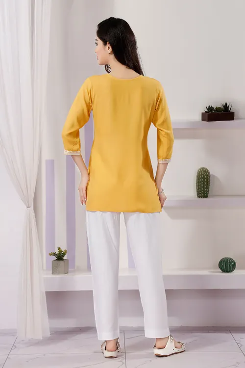Trendy Short Kurti in White Rayon Fabric with Chikankari Embroidery