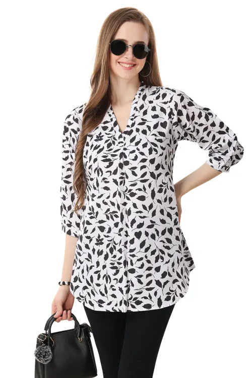 Fashionable Faux Crepe Tunic Featuring a Bold Black and White Print