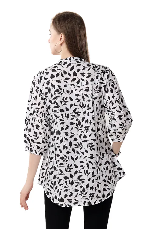 Fashionable Faux Crepe Tunic Featuring a Bold Black and White Print