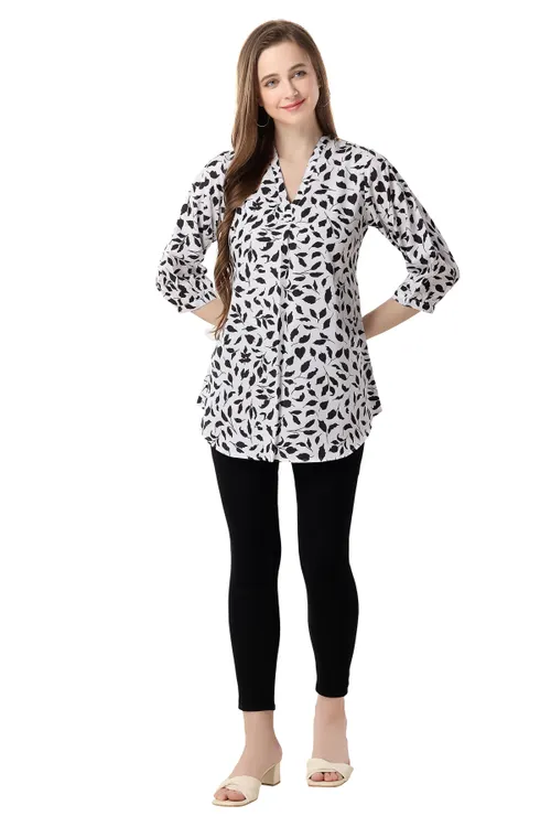 Fashionable Faux Crepe Tunic Featuring a Bold Black and White Print