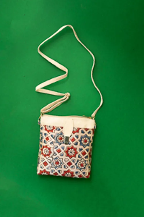 Off white silk with ajrakh floral print sling bag