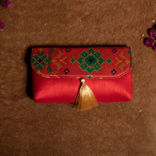 Orange Ikat Print Clutch Bag