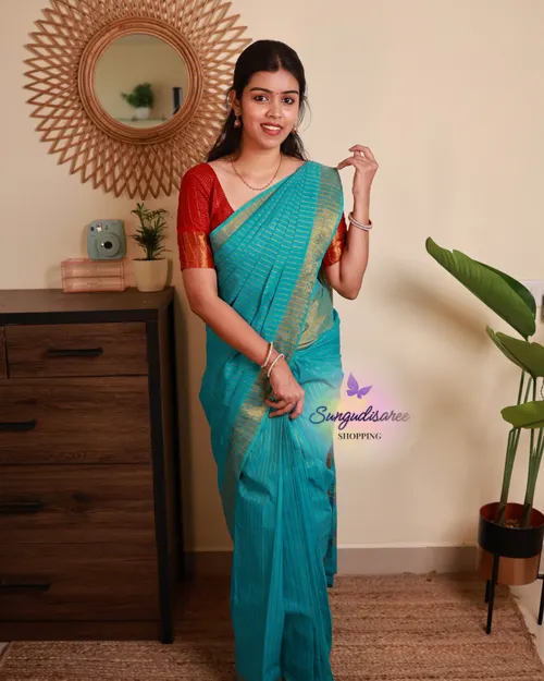 Sky blue saree with red blouse