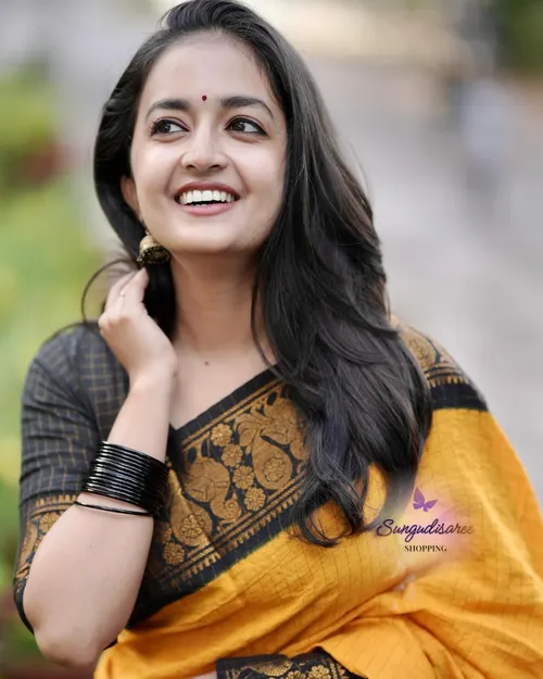 Mustard with black zari kattam saree